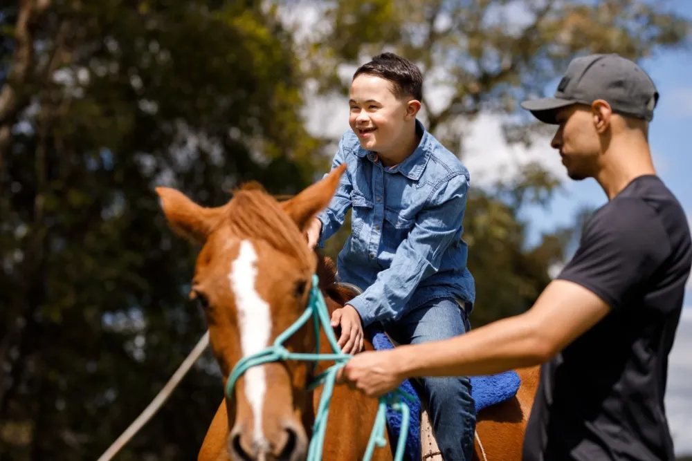 how equine assisted therapy helps people with disabilities